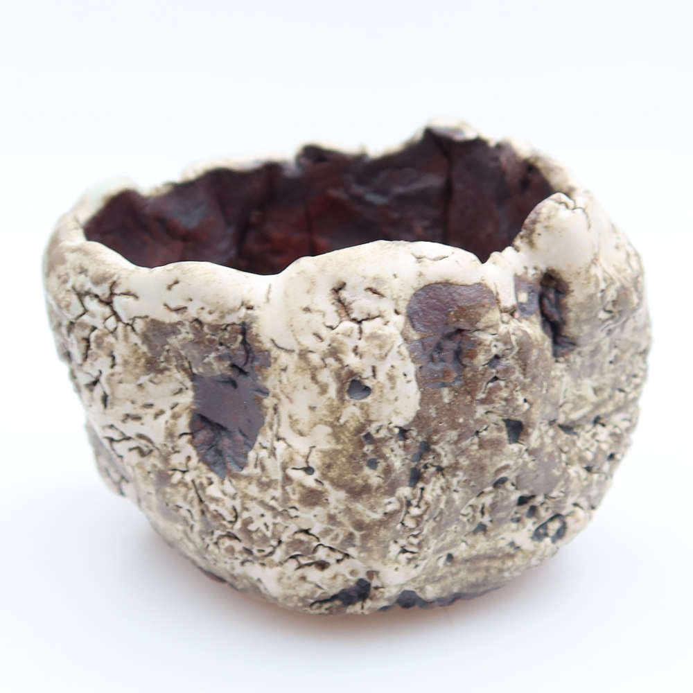 Kerámia héj  7 x 6 x 6 cm, barna-fehér színű